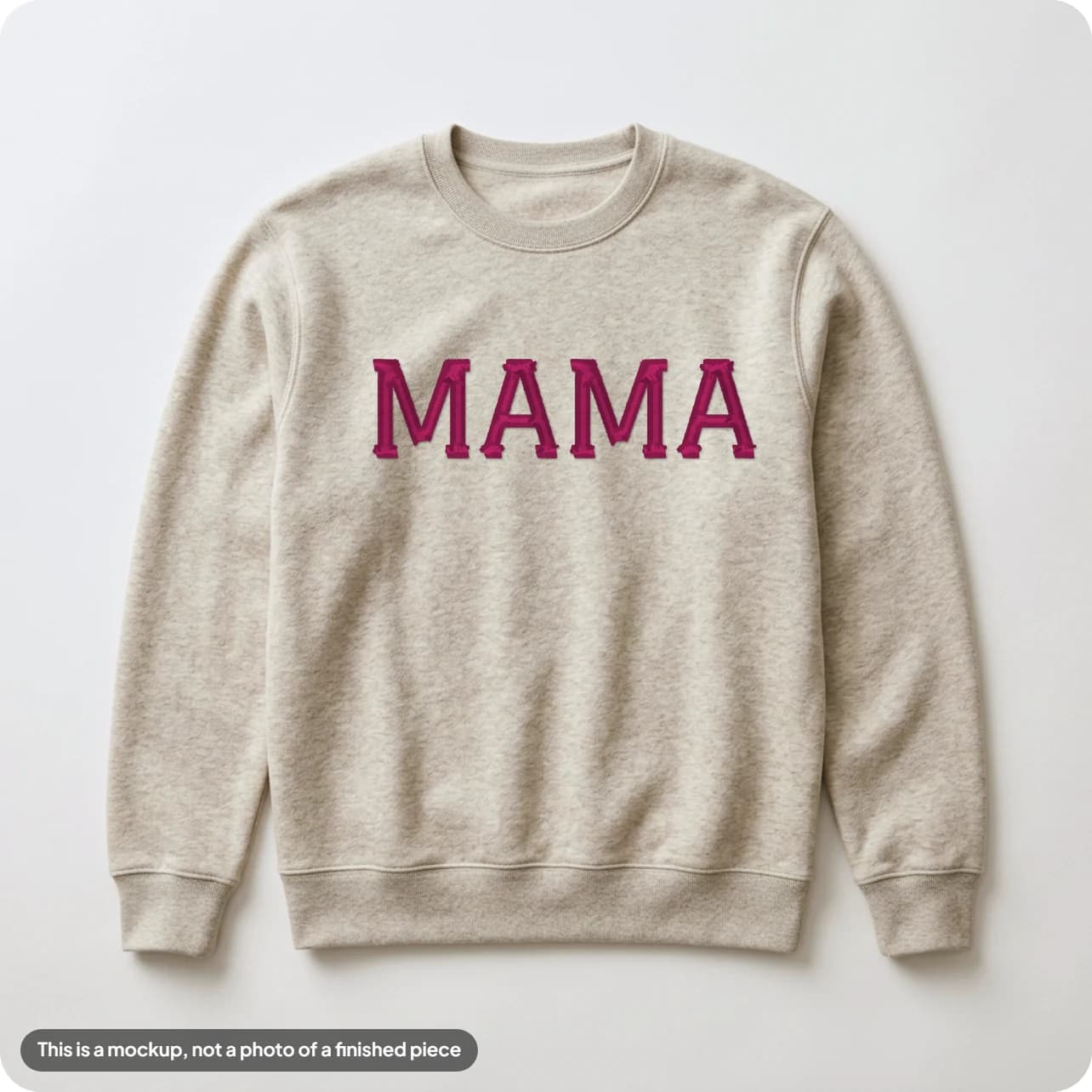 A mockup of MAMA in varsity lettering on a crewneck
